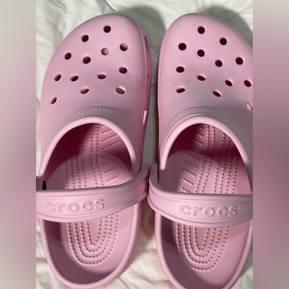 Pink color Crocs, gently used, in perfect condition, smoke & pet free home.